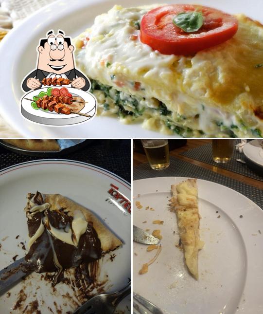 Comida em Pizzaria Tortelli