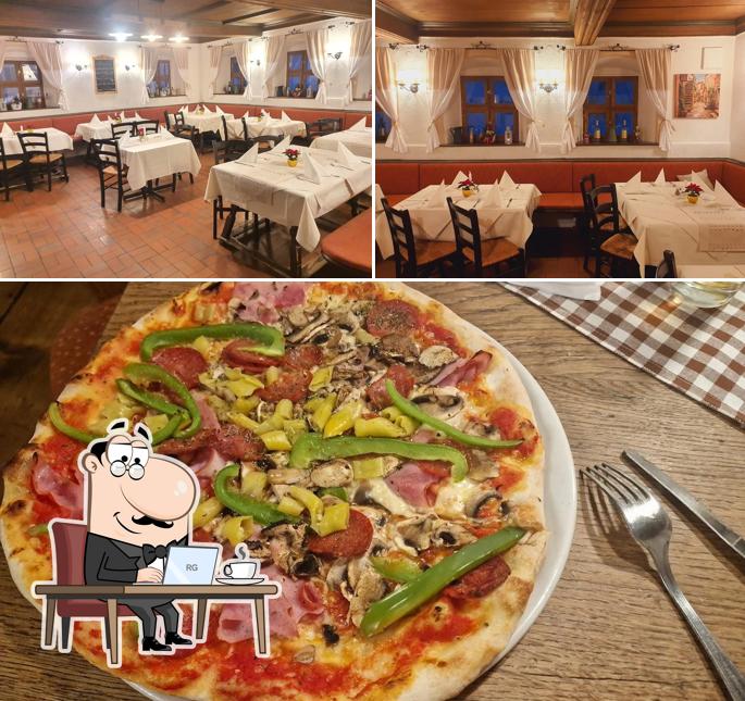 La photo de la intérieur et pizza de La Vecchia Trattoria’s