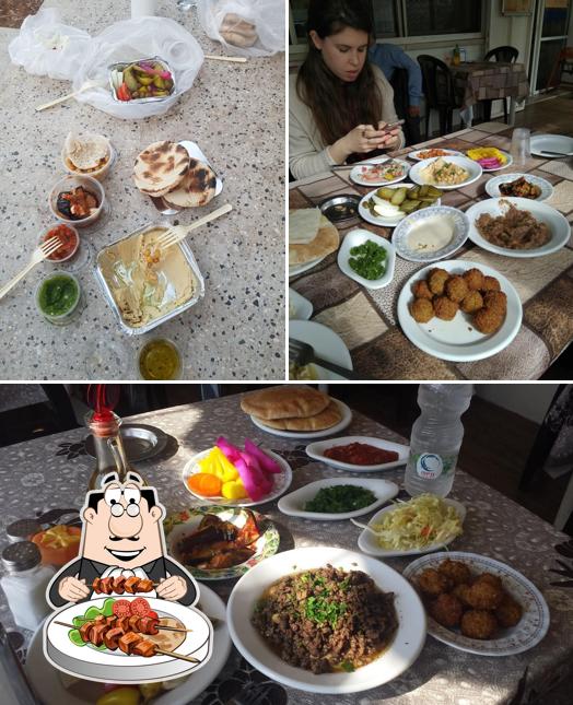 Platos en חומוס מסעדת אבו ראמי פול