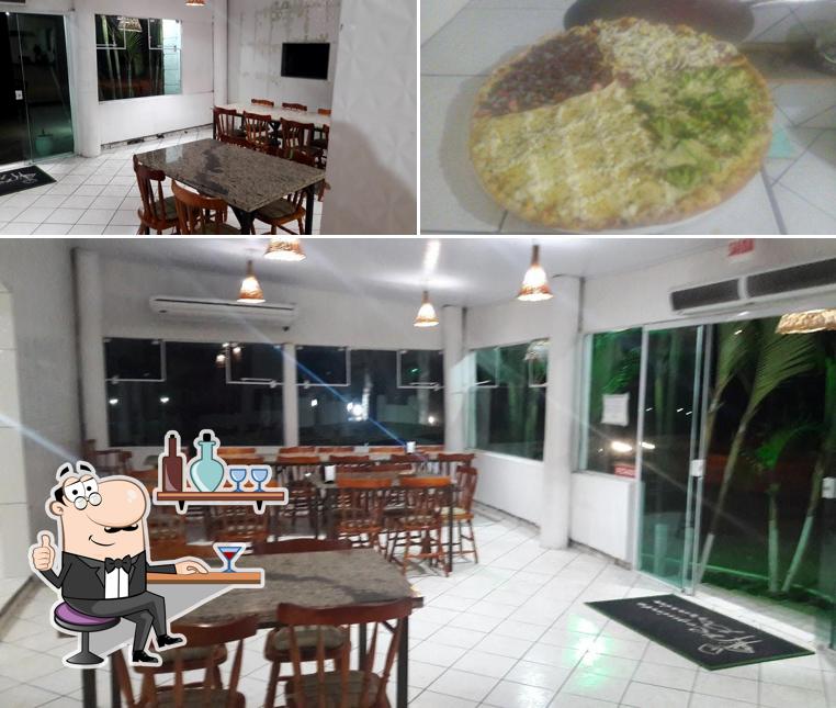 A foto da interior e comida no Requinte Pizzaria - O verdadeiro sabor Italiano