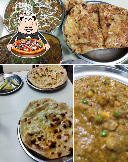 Try out pizza at Khandelwal Pavitra Bhojnalaya