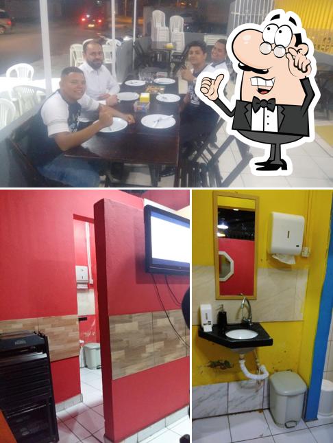 Veja imagens do interior do Bella Pizza