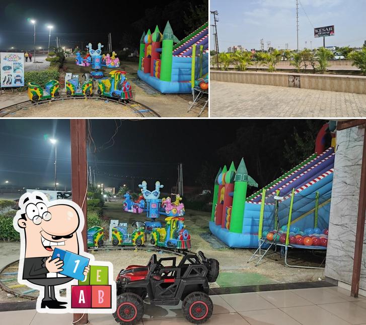 Among different things one can find play area and exterior at Kesar Dhaba