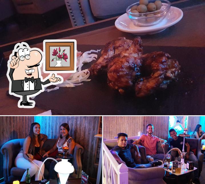 Among different things one can find interior and food at Bar Central VIP Cervecera