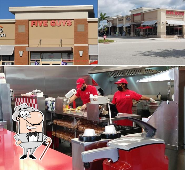Check out the photo displaying exterior and interior at Five Guys
