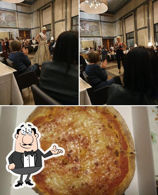 Dai un’occhiata alla foto che mostra la interni e pizza di Pizza Export D'Azeglio