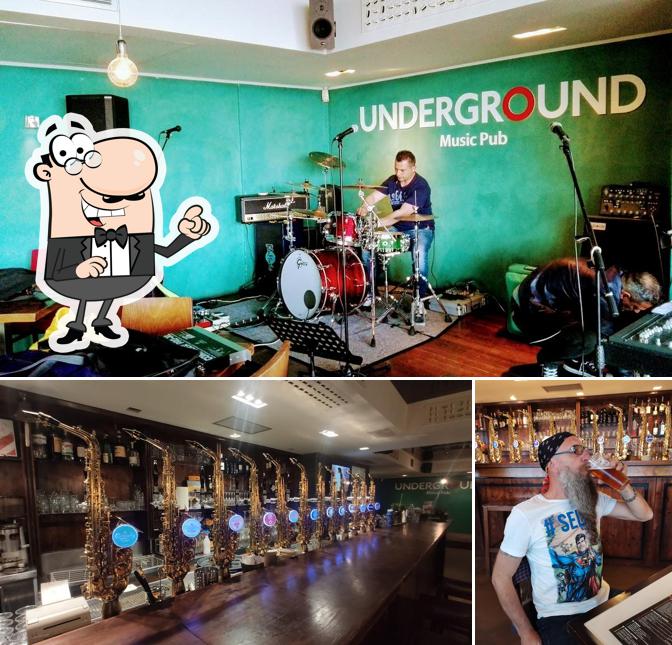 Siediti a un tavolo di Underground Music Pub
