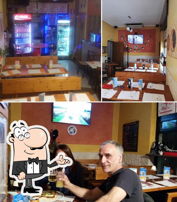 Dai un'occhiata agli interni di Pizzeria Snoopy Ivan