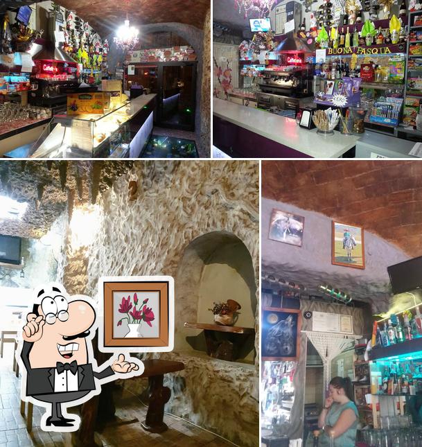 This is the image depicting interior and bar counter at Bar Pub La Grotta Del Lupo