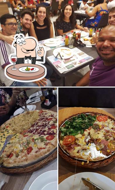 Entre diversos coisas, comida e interior podem ser encontrados a Bella Pizza