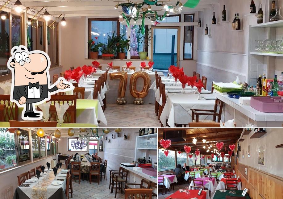 Dai un'occhiata agli interni di Bar Pizzeria Rosticceria Tavola Calda Gerani Roma