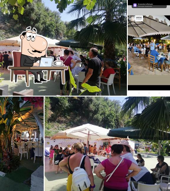 Siediti a un tavolo di Ristorante Il Giardino Del Mare