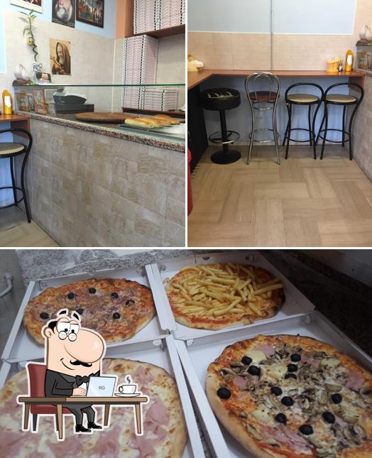 Tra le varie cose da Pizzeria Santa Maria si possono trovare la interni e pizza