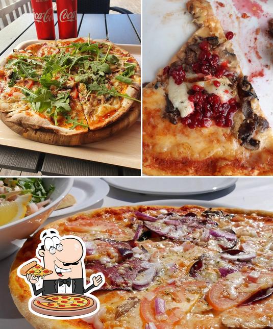 Try out pizza at Kyrkbyns Bistro & Pizzeria
