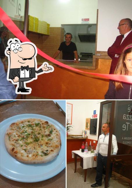 La immagine di interni e pizza da C'è Pizza per Te