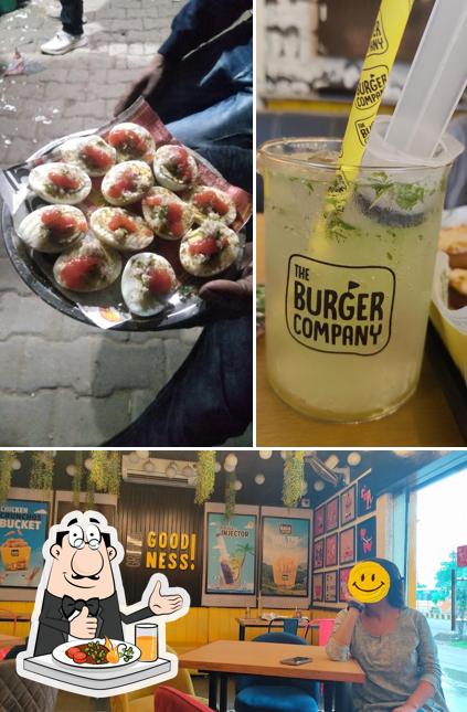 Take a look at the picture showing food and interior at The Burger Company