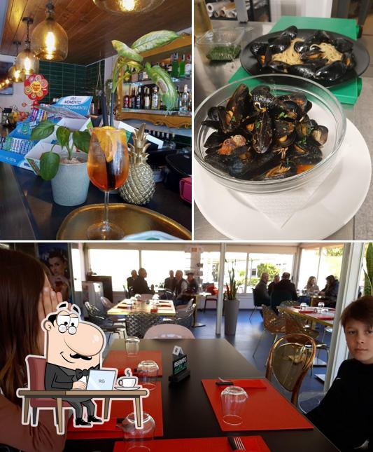 Questa è la foto che presenta la interni e frutti di mare di Ristorante BOHEMIAN