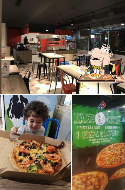 La immagine della cibo e interni di Domino's Pizza Carl-Vogt