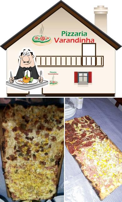 A ilustração do Pizzaria Varandinha Gonçalves MG’s comida e exterior