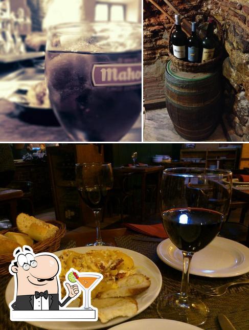 Check out the image displaying drink and dining table at Taberna Miranda