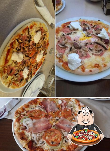 Prenez des pizzas à Di Angolo Pizzeria