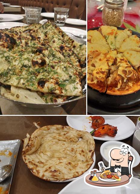Try out pizza at Shalimar Restaurant