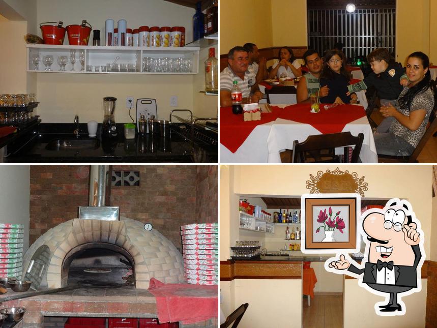 O interior do Pizzaria Benvenuto