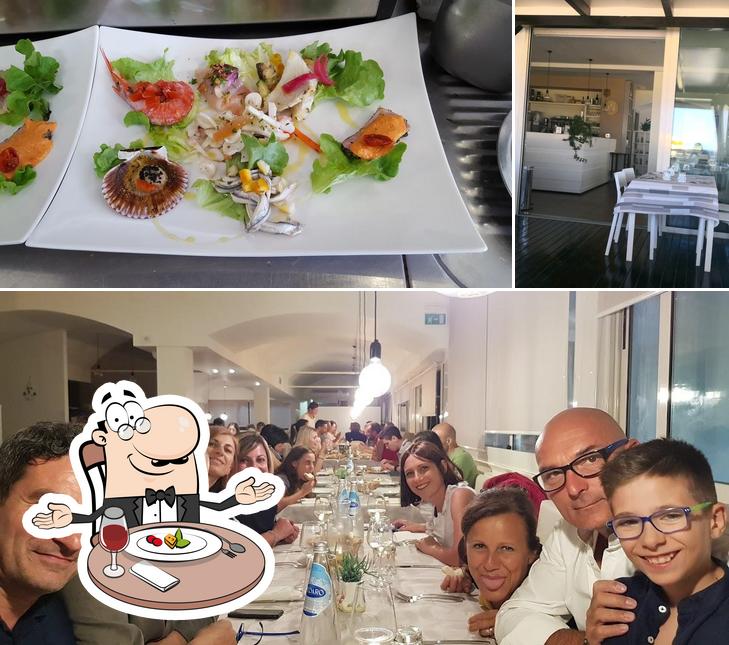 L’image de la table à manger et nourriture de RISTORANTE IL PESCE INNAMORATO’s