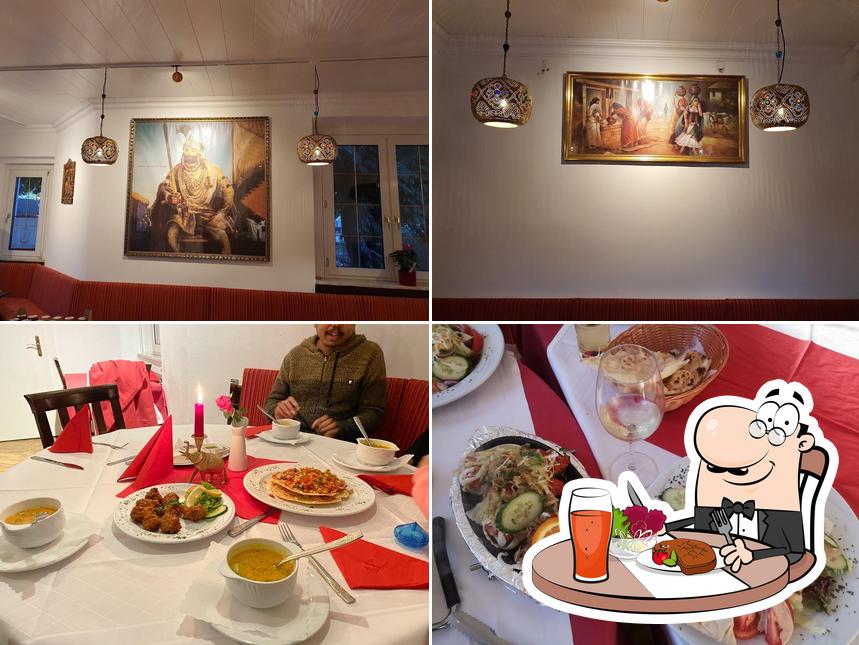 Jetez un coup d’oeil à la photo représentant la table à manger et intérieur concernant Bella Tandoori Regensburg