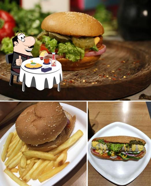 Order a burger at Uttam's Bakery & Restaurant