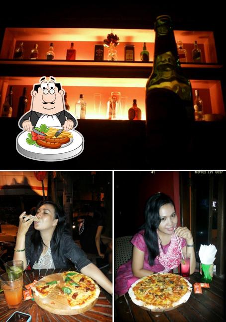 This is the picture depicting food and beer at LuCifer Bar & Resto