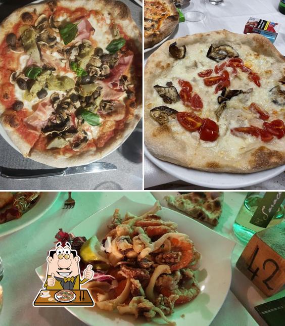 A Ristorante Pizzeria "Isola Verde", puoi ordinare una bella pizza