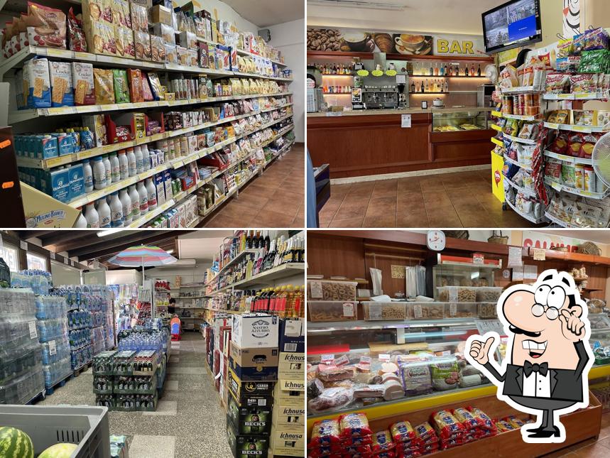 Dai un'occhiata agli interni di Labbate Supermercato & Bar