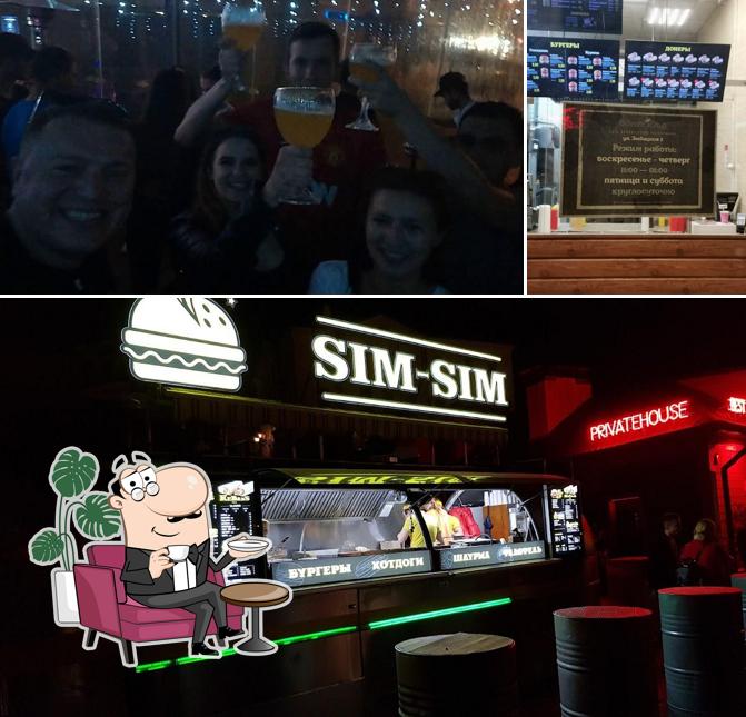 This is the image depicting interior and bar counter at Sim Sim