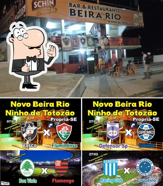 Это фото паба и бара "Bar Beira Rio Ninho de Totozão"