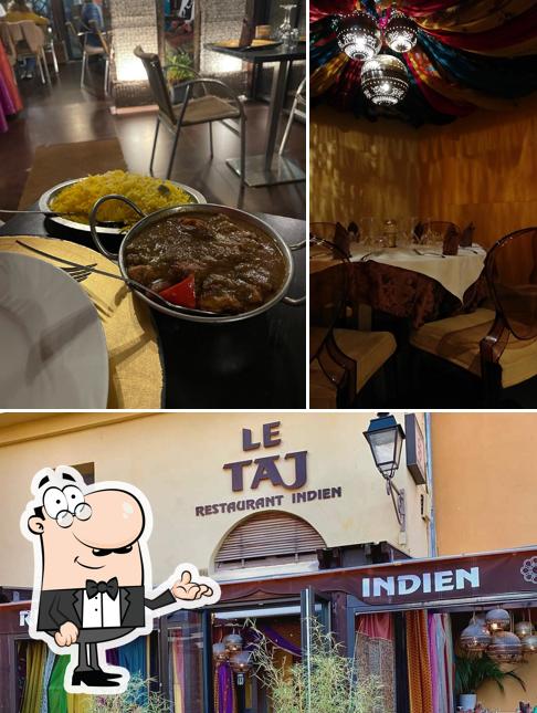 L’image de la intérieur et table à manger de Le Taj’s