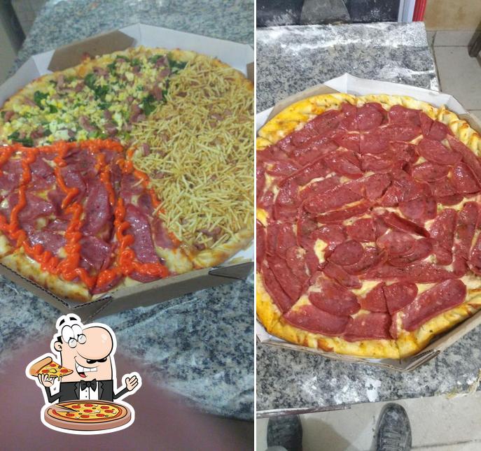 At Pizzaria Siri-Pizzas, lanches, Calzones, pastéis e cachorro quente.., you can try pizza