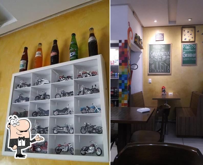 O interior do Pizzaria Paulista