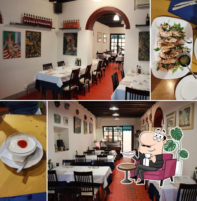 Siediti a un tavolo di Trattoria Il Vagone
