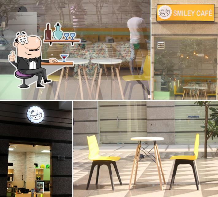 The interior of CAFE SMILEY 2.0 - The Family Restaurant Best cafe and Restaurant in Faridabad Private Party Space l Unlimited Buffet