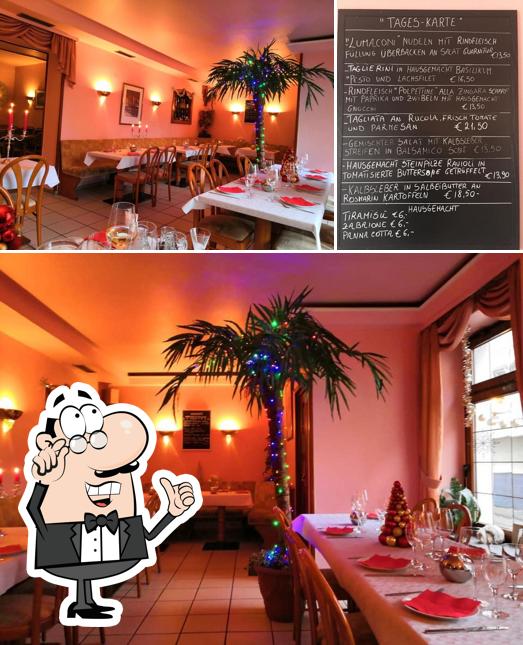 The image of interior and blackboard at Le Palme