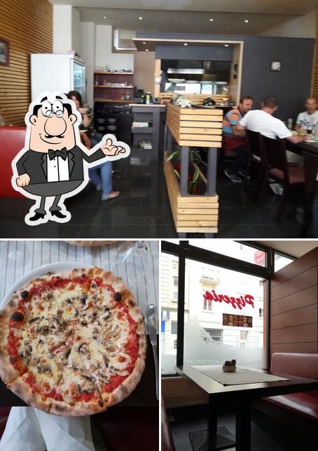 Jetez un coup d’oeil à l’image indiquant la intérieur et pizza concernant Restaurant Terres Rouges