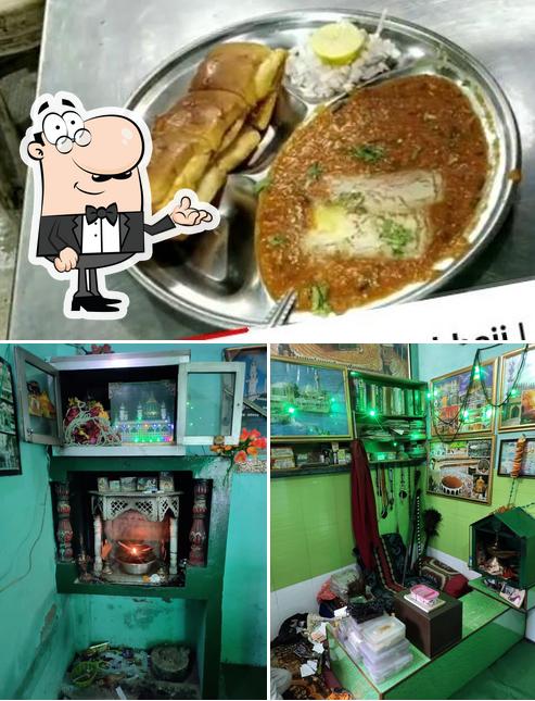 Take a look at the image depicting interior and food at Pandit Ji Special Pav Bhaji