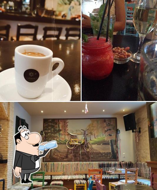 Check out the image displaying drink and interior at Avli Cafe