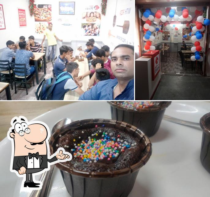Among different things one can find interior and cake at Red Spring Pizza