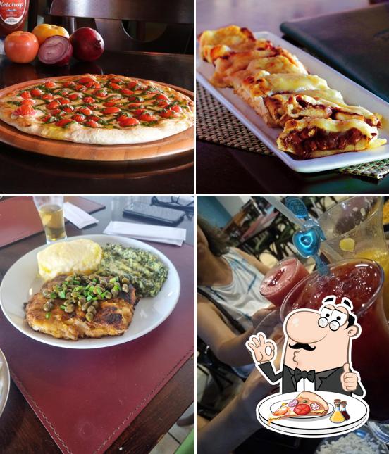 Try out pizza at Moqueca Mar