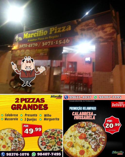 A imagem da comida e exterior a Marcílio Pizza