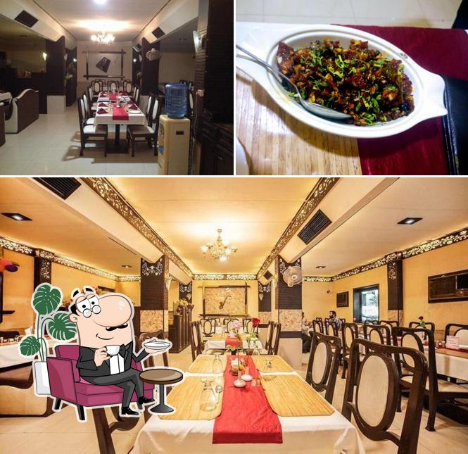 Among different things one can find interior and meat at Harmony's Restaurant, Hotel Santoor