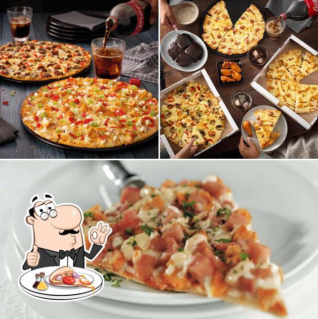 A Debonairs Pizza, vous pouvez profiter des pizzas