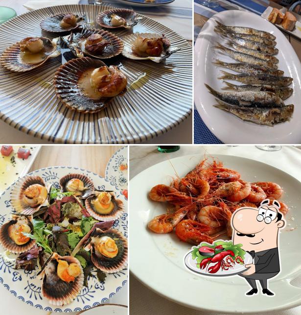 Elige entre las diferentes comidas con marisco que te ofrecen en Cal Tito